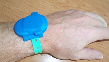 fig. 9 - fastening a tag on the wrist